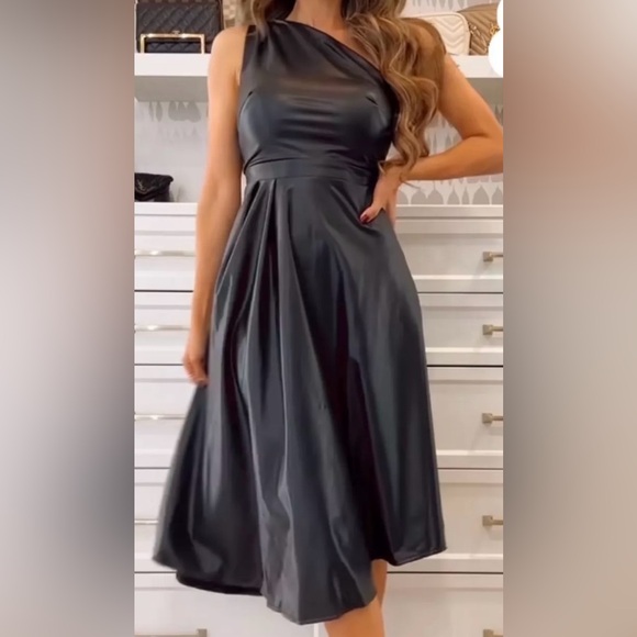 JM Collection Dresses & Skirts - Sofia Vergara Black Dress.   FAUX
LEATHER
FITS LIKE A GLOVE!!